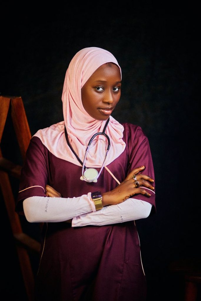 pexels photo 30722675 Young nurse wearing a hijab with a stethoscope, standing confidently in medical attire.